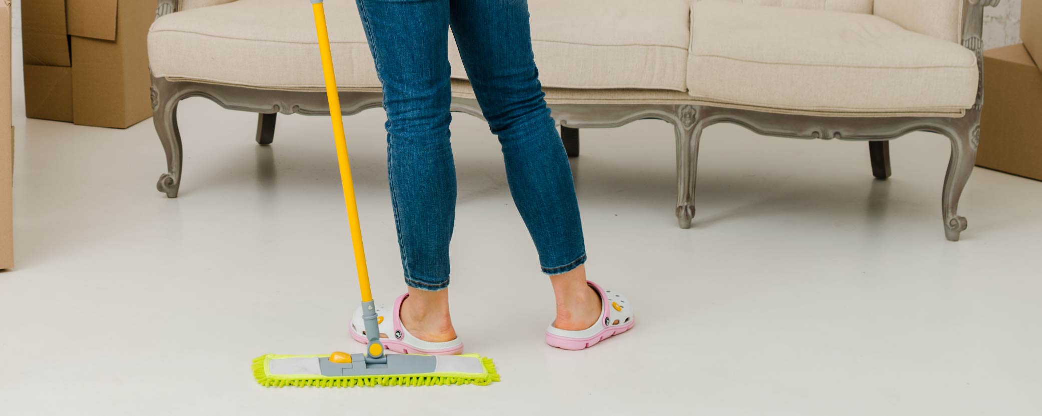 A woman does a final sweep of her home before moving.