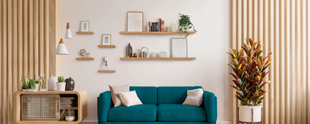 A wall with floating shelves and a few plants and ornaments on them